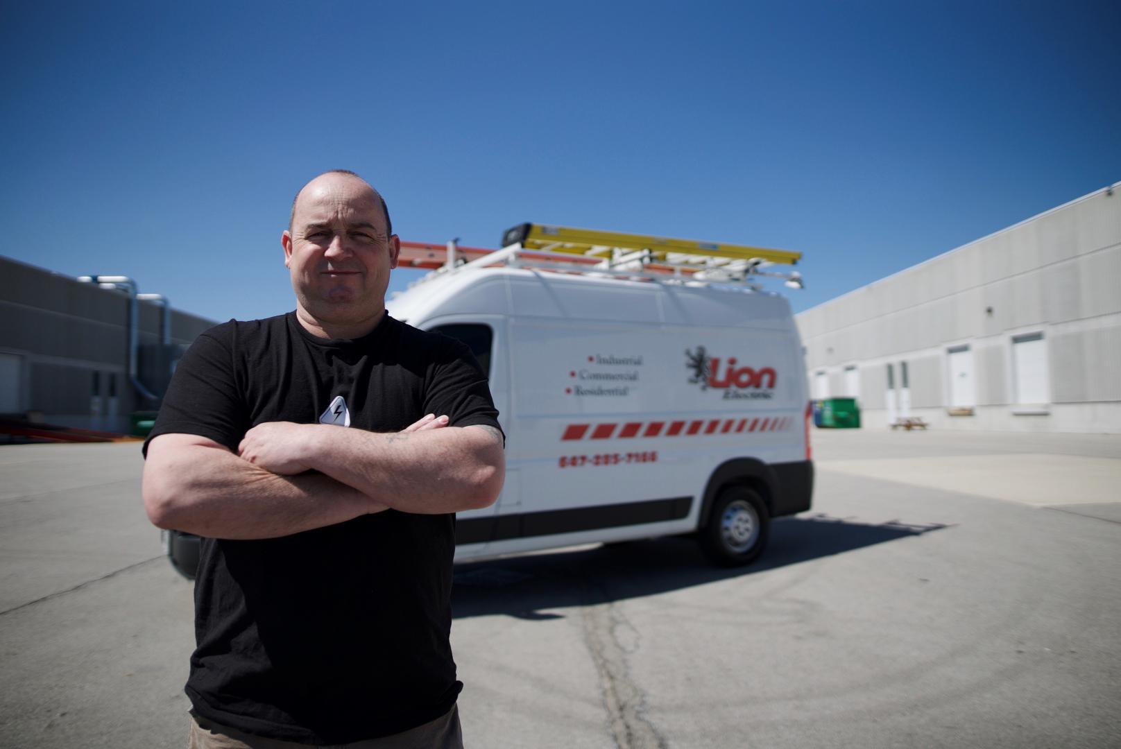 Lion Electric chief electrician with service van